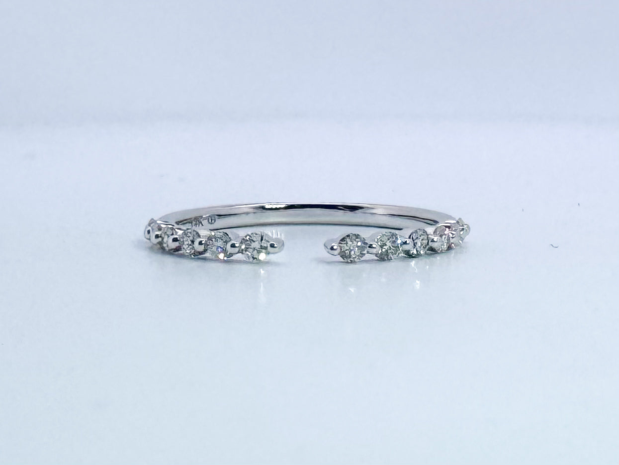 14K, White gold, open concept, natural diamond band. .24 carat total weight.