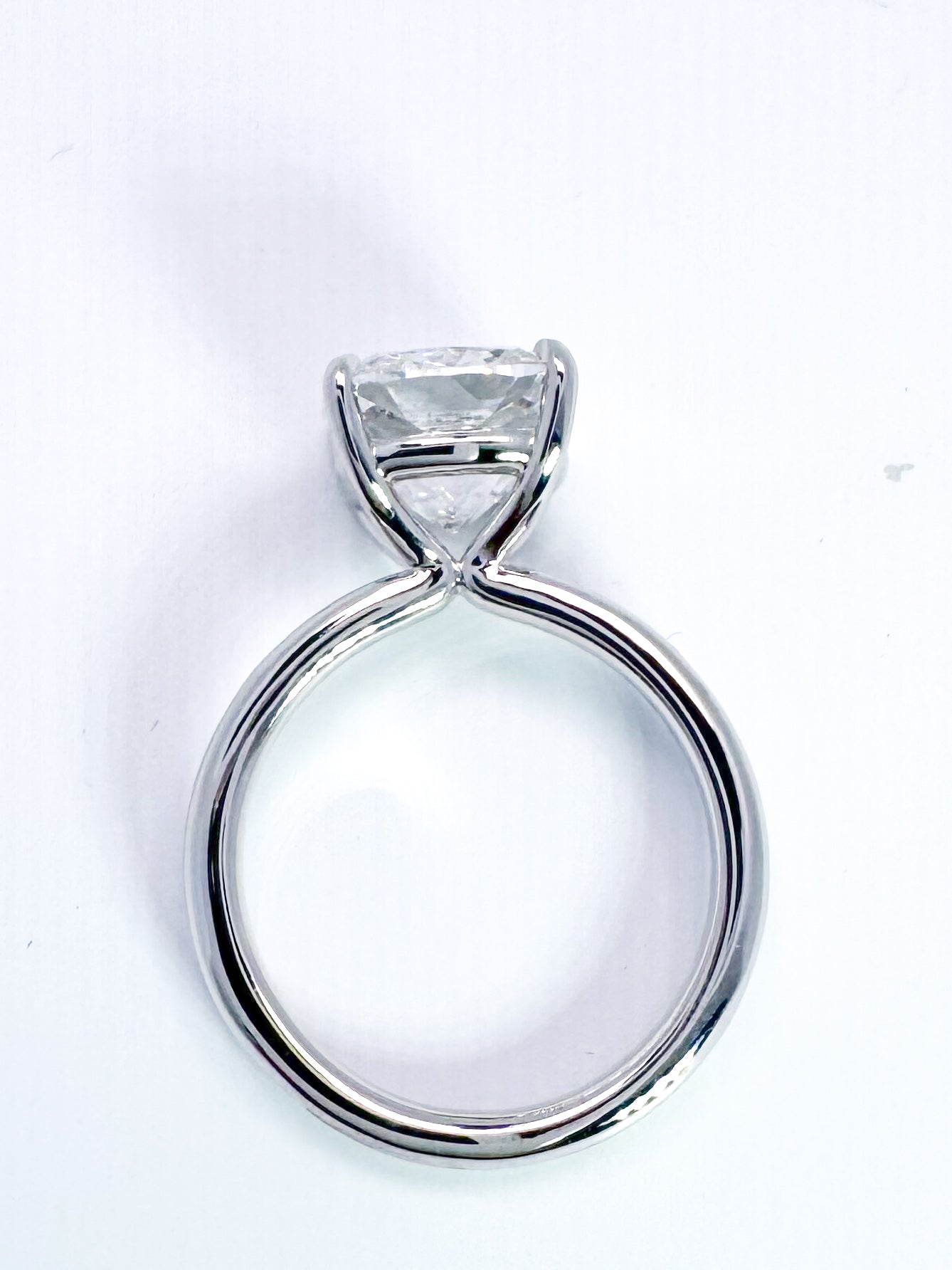 14k, White gold, 5.02 lab grown cushion cut diamond set in solitaire. IGI certified