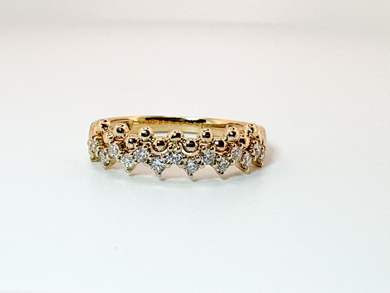 14K, yellow gold jaggad diamond band. .33 diamond total weight.