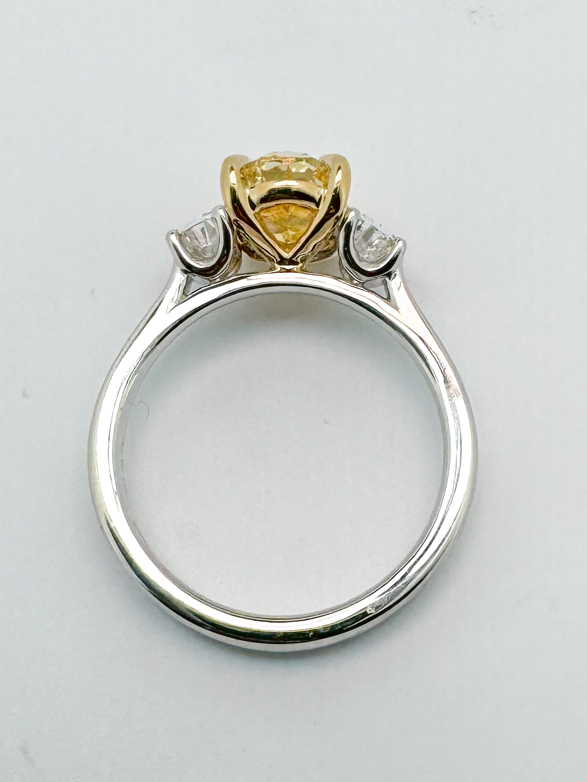 14K two tone 2.01 VS2 Fancy vivid yellow set with .45 side diamonds. Lab grown diamond engagement ring