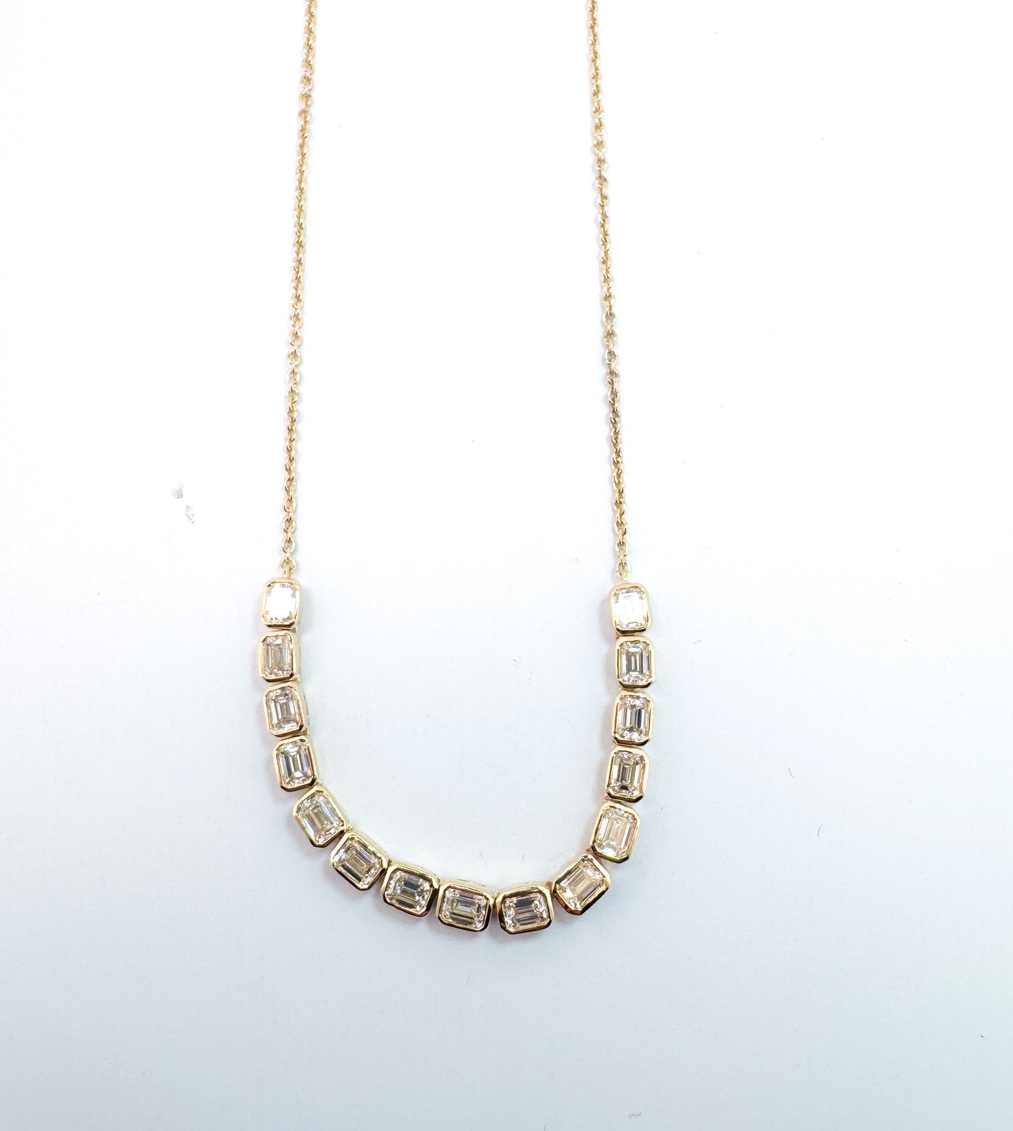 14k, Yellow gold, 2.40 carat total weight, natural emerald cut diamond necklace.