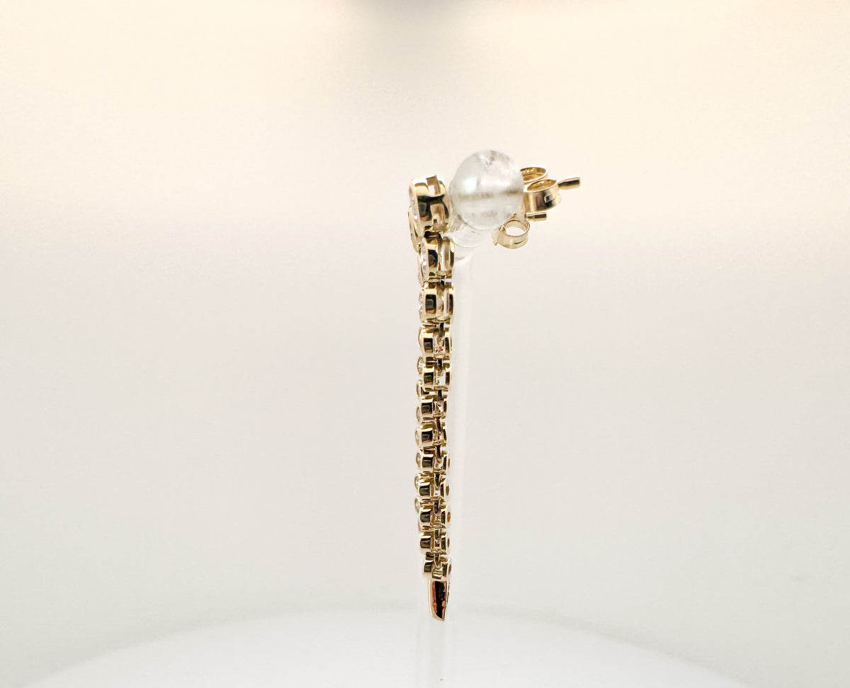 14K, Yellow gold .77 dtw bezel set diamond dangle earrings.