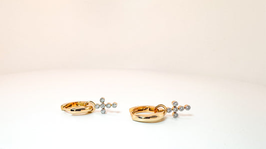14K, yellow gold, .14 diamond total weight. cross  lab diamond earring