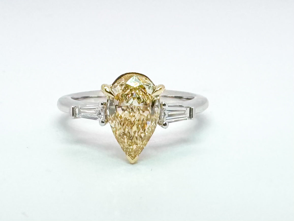 14K two tone, 1.54 pear shaped VS2 Fancy yellow lab grown diamond engagement ring.