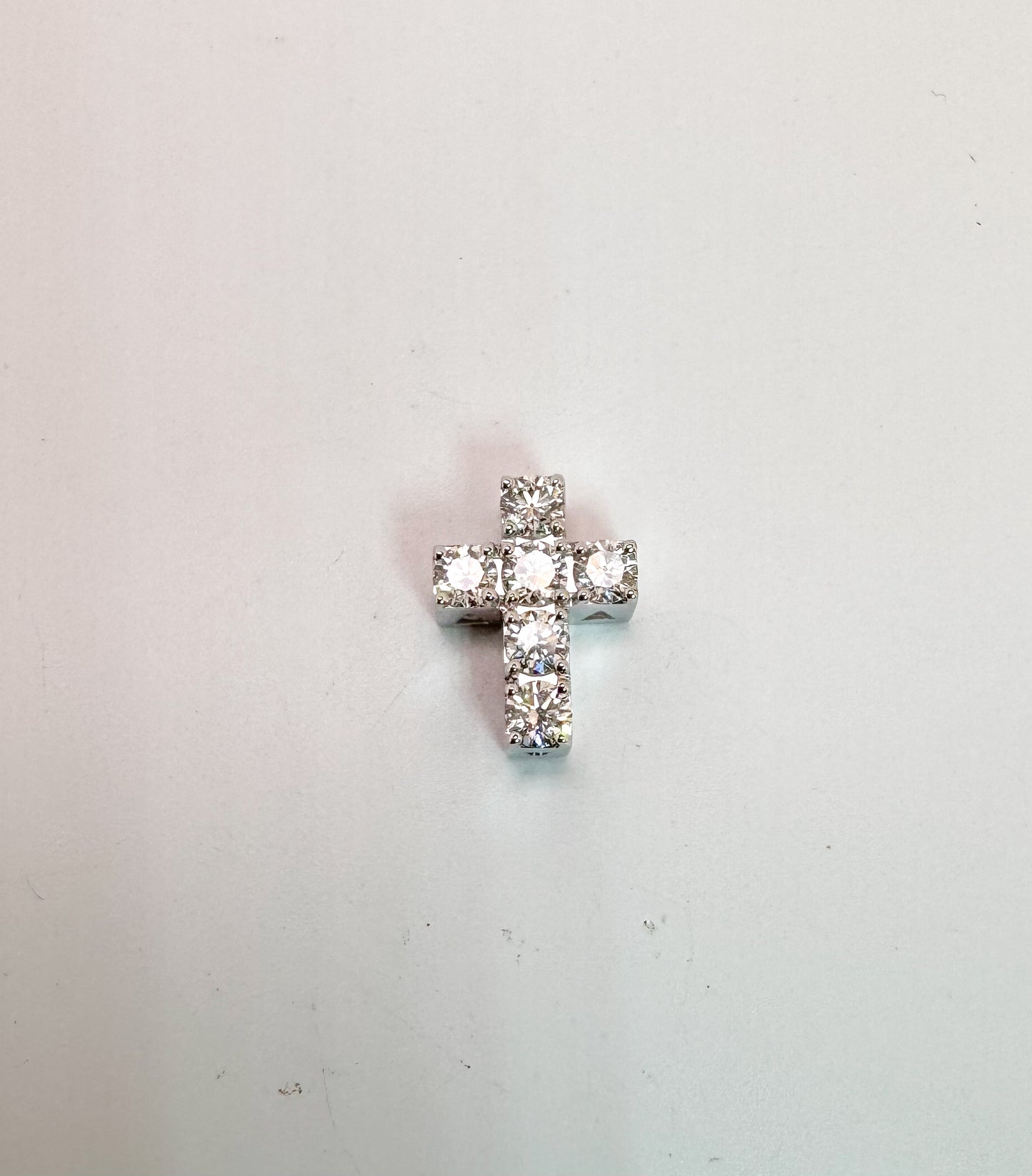 18k, white gold, .38 carats natural diamond mini cross.