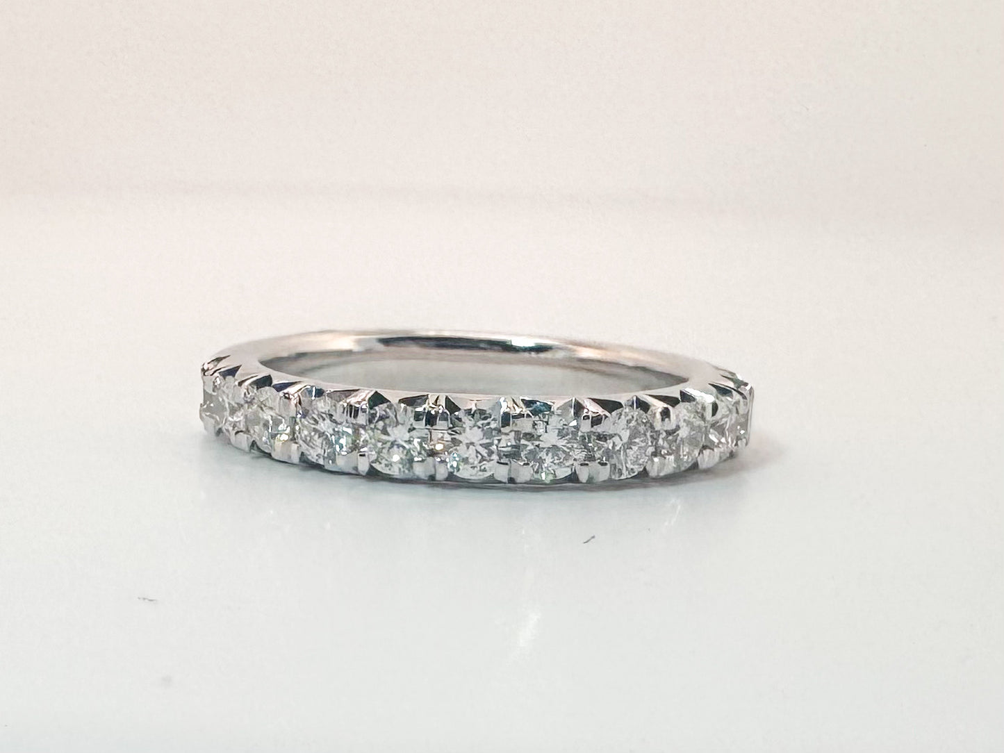 18K, White gold, .78 diamond total weight, natural diamond band.
