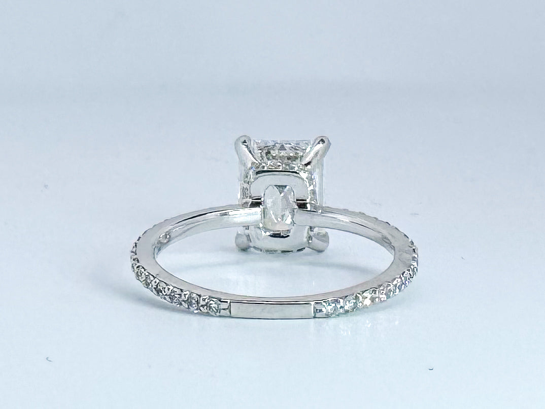 2.05 Natural VS1 E Emerald cut diamond set in classic diamond hidden halo engagemet ring. GIA certified