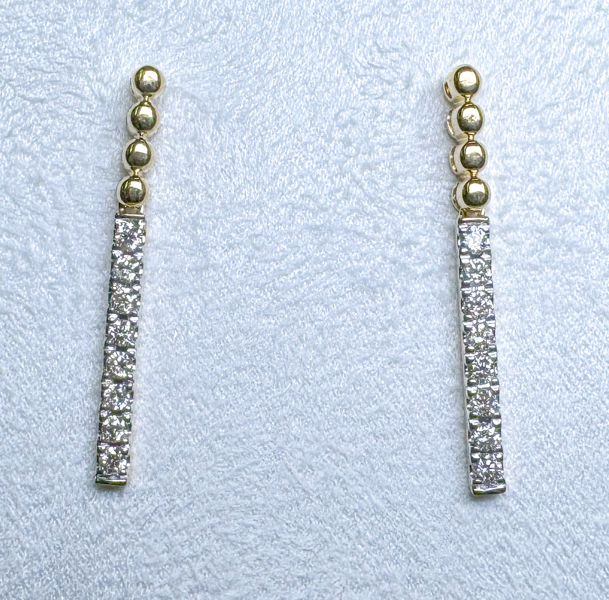 14k, Yellow gold, diamond drop earrings. .30 diamond total weight.