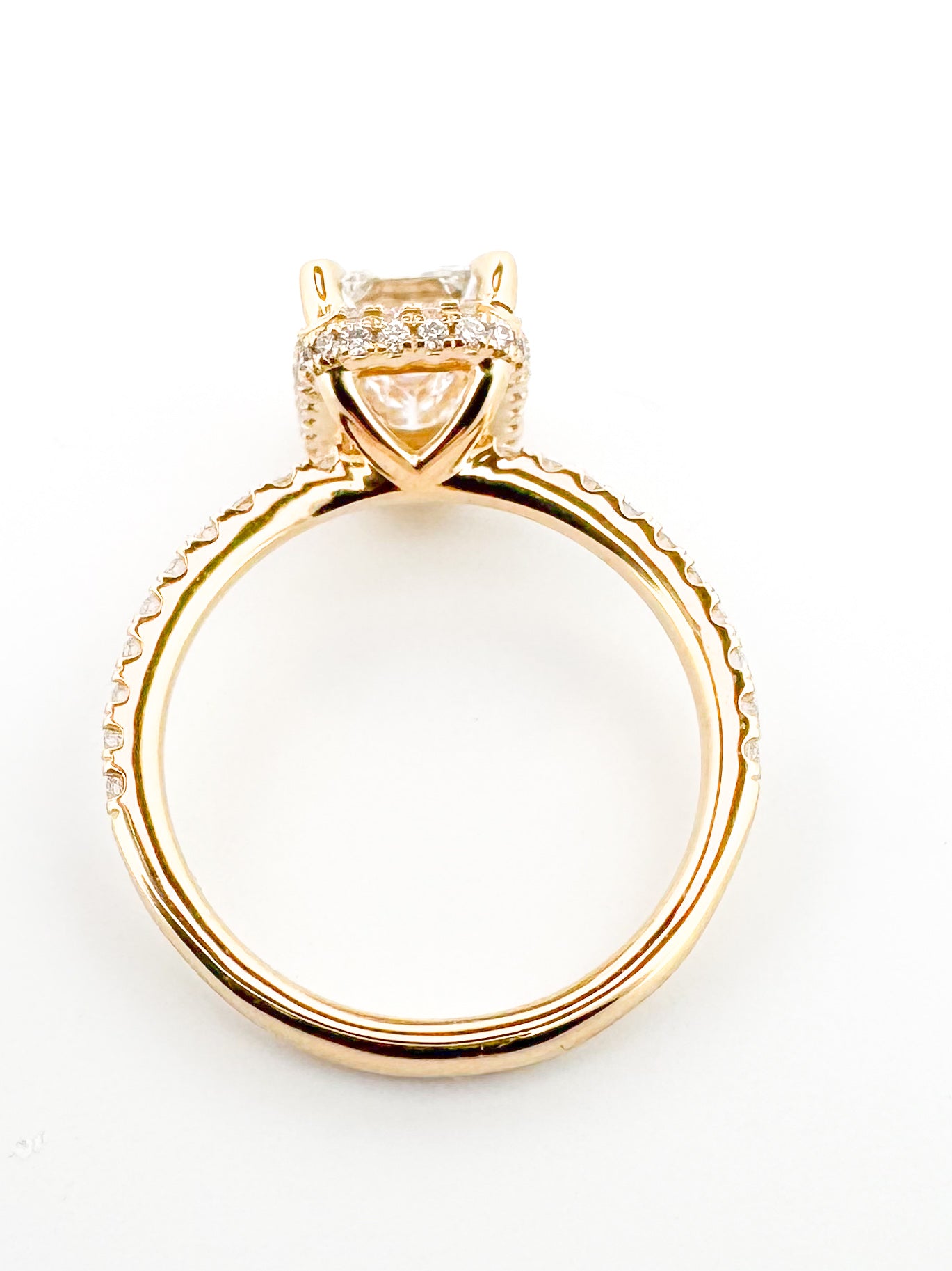 14K, Yellow gold, 2.07 Emerald cut enter set with .40 side diamonds. VS2, F. IGI certified