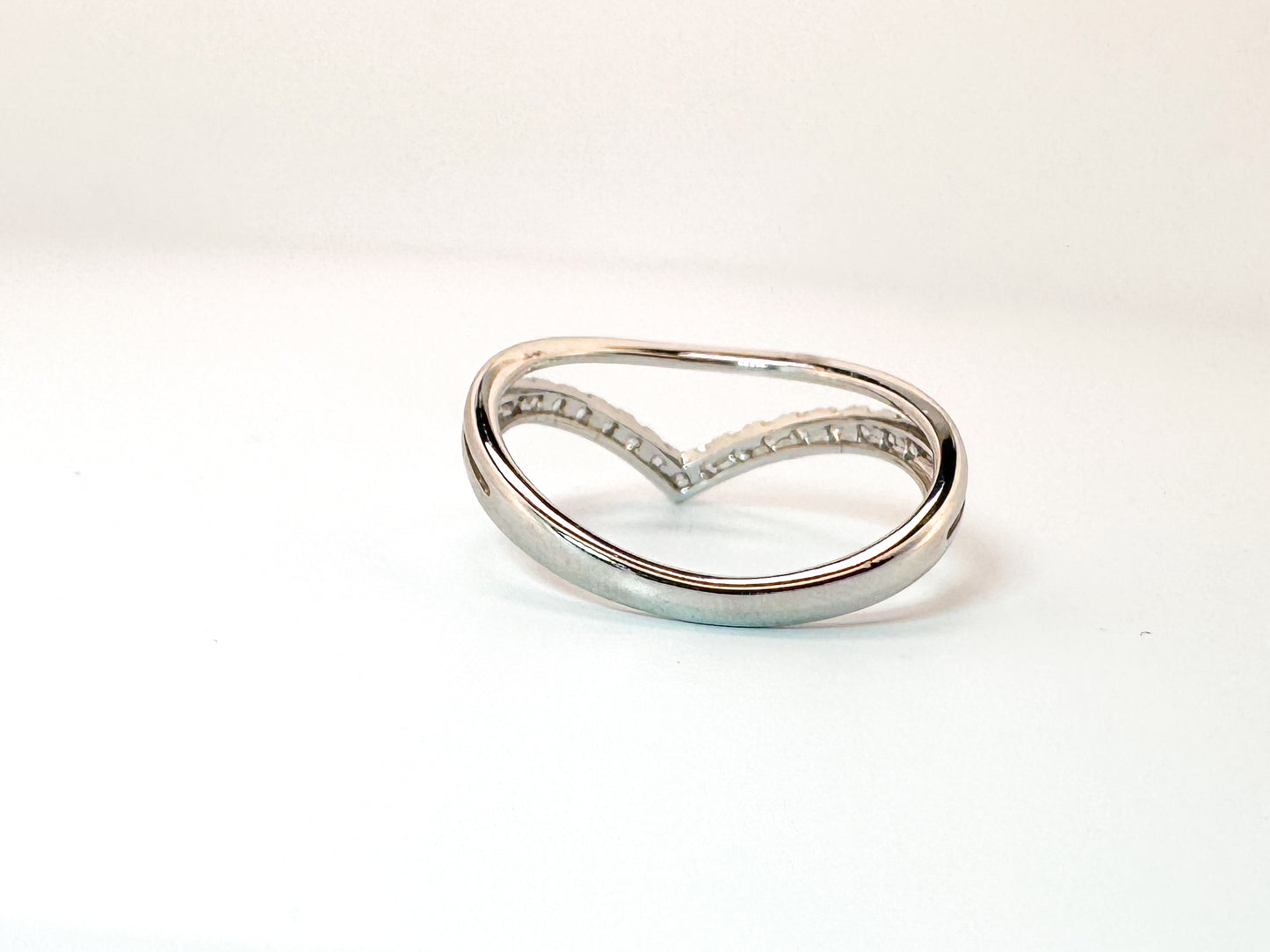 14k, white gold .30 diamond total weight wedding band.
