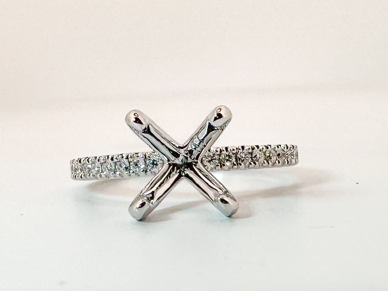 14K, white gold, .20 carat total weight, diamond semi mount for an 8mm stone.