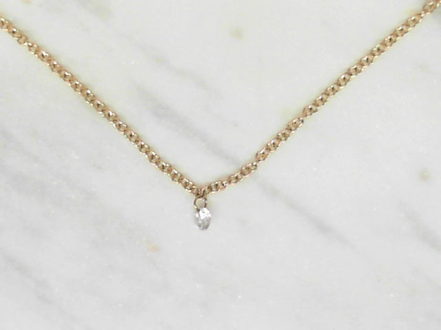 Drilled diamond floating pendant