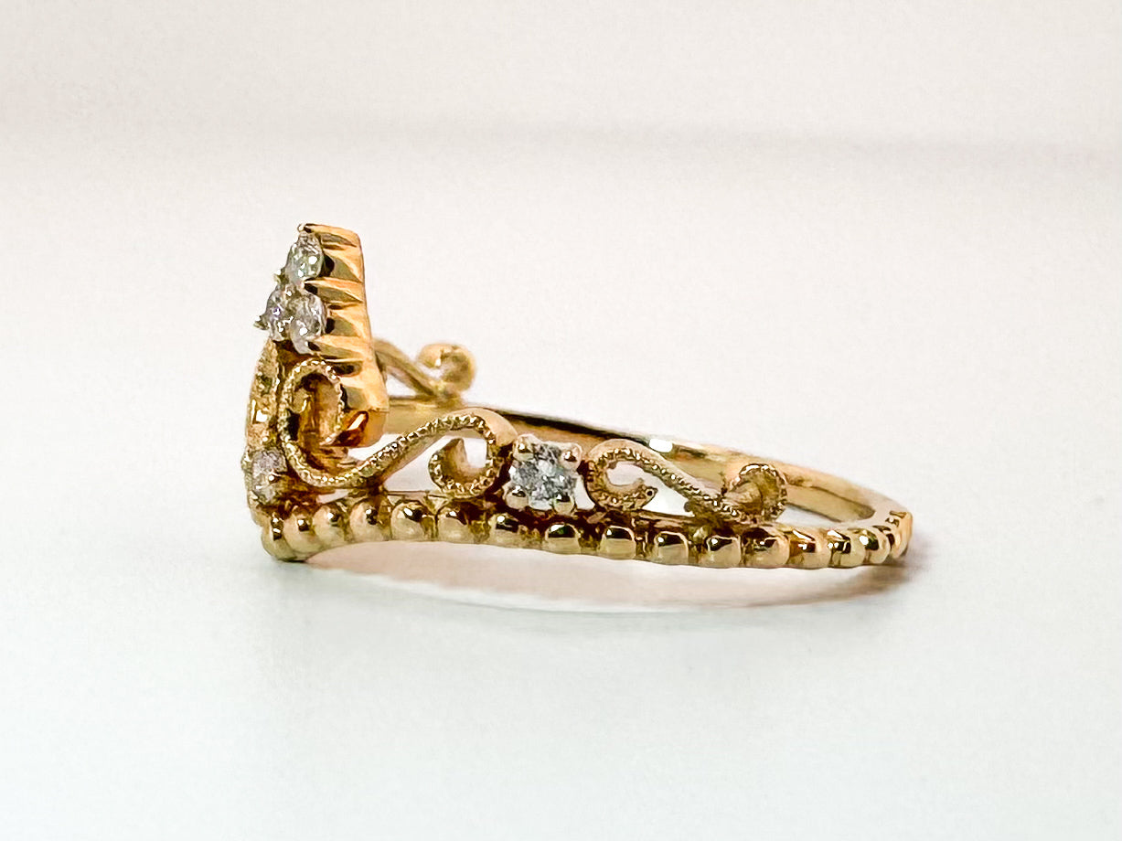 14k, Yellow gold .14 diamond total weight crown ring.