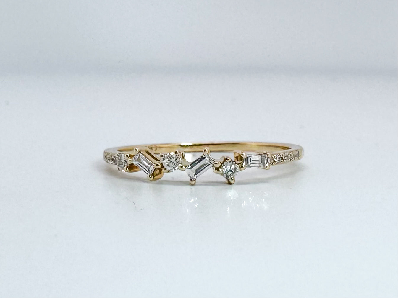 14K, Yellow gold .23 diamond total weight, baguette and round brilliant diamond band