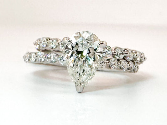 14k, White gold, lab diamond engement ring. 1.23 Pear shaed center with .72 side diamonds.