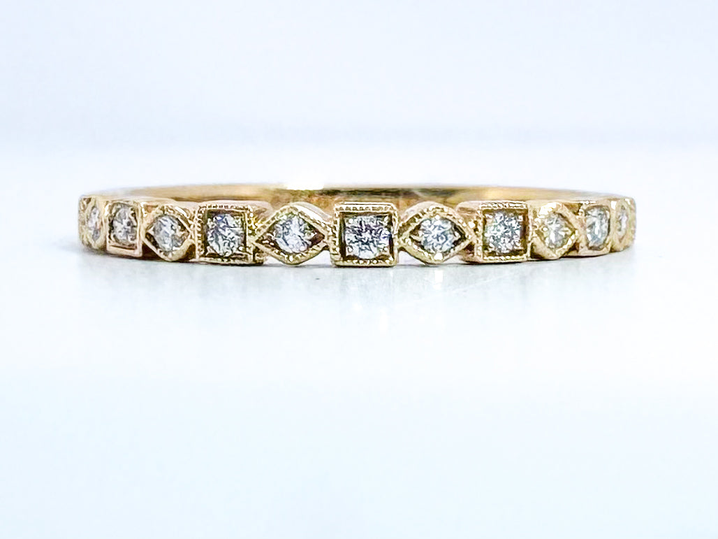 18k, .20 diamond total weight, wedding/anniversary band.