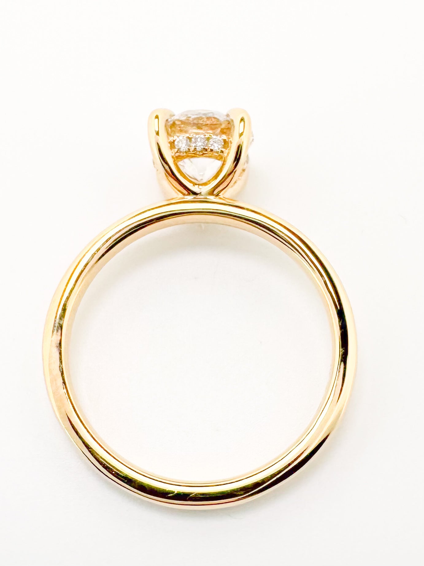 14k, Yellow gold , 1.59 E VS2 Ideall cut, lab grown, round brilliant  set with .07 side diamond halo. IGI Certified