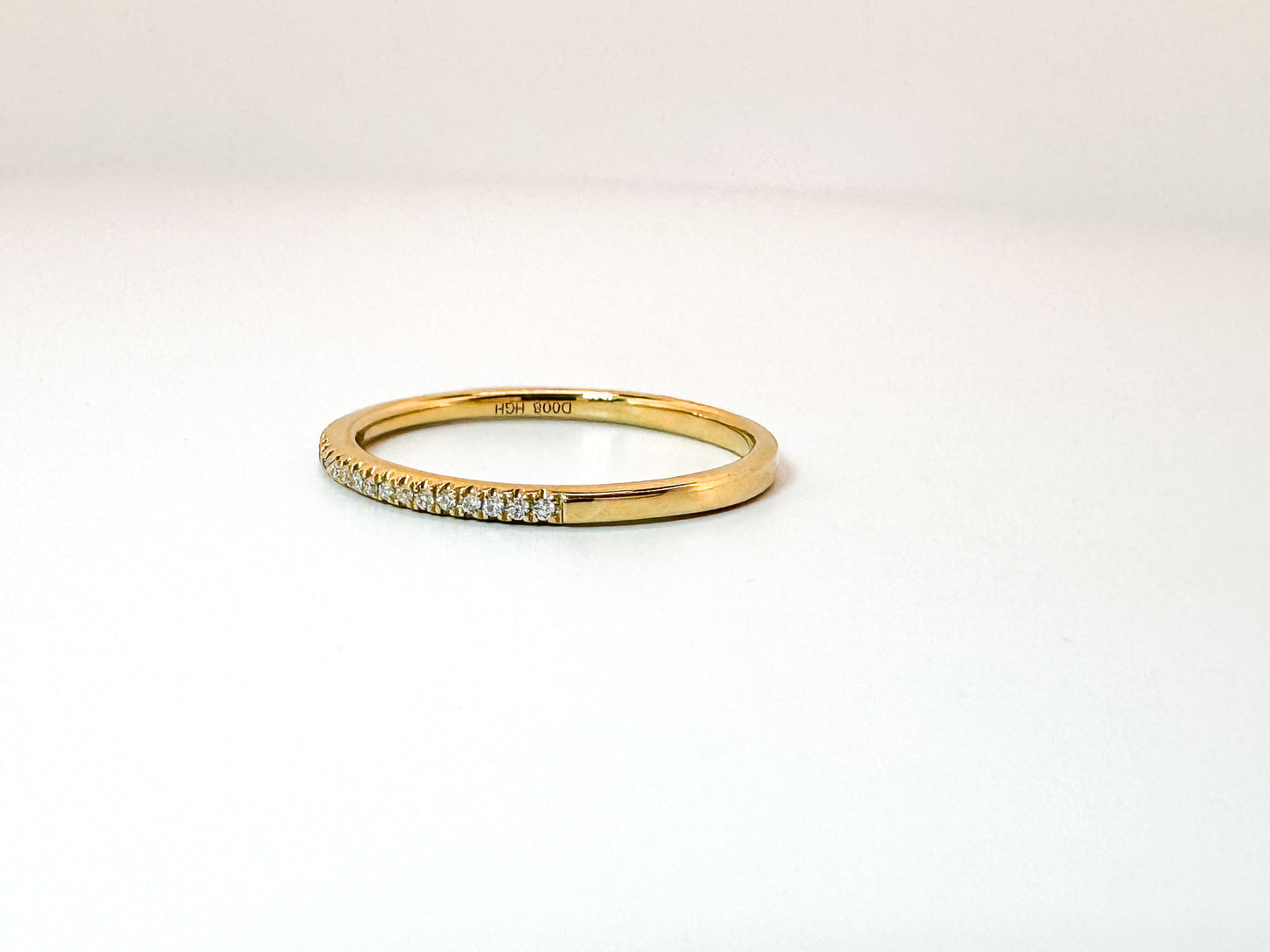 14k,Yellow gold, .08 carat diamond wedding band.