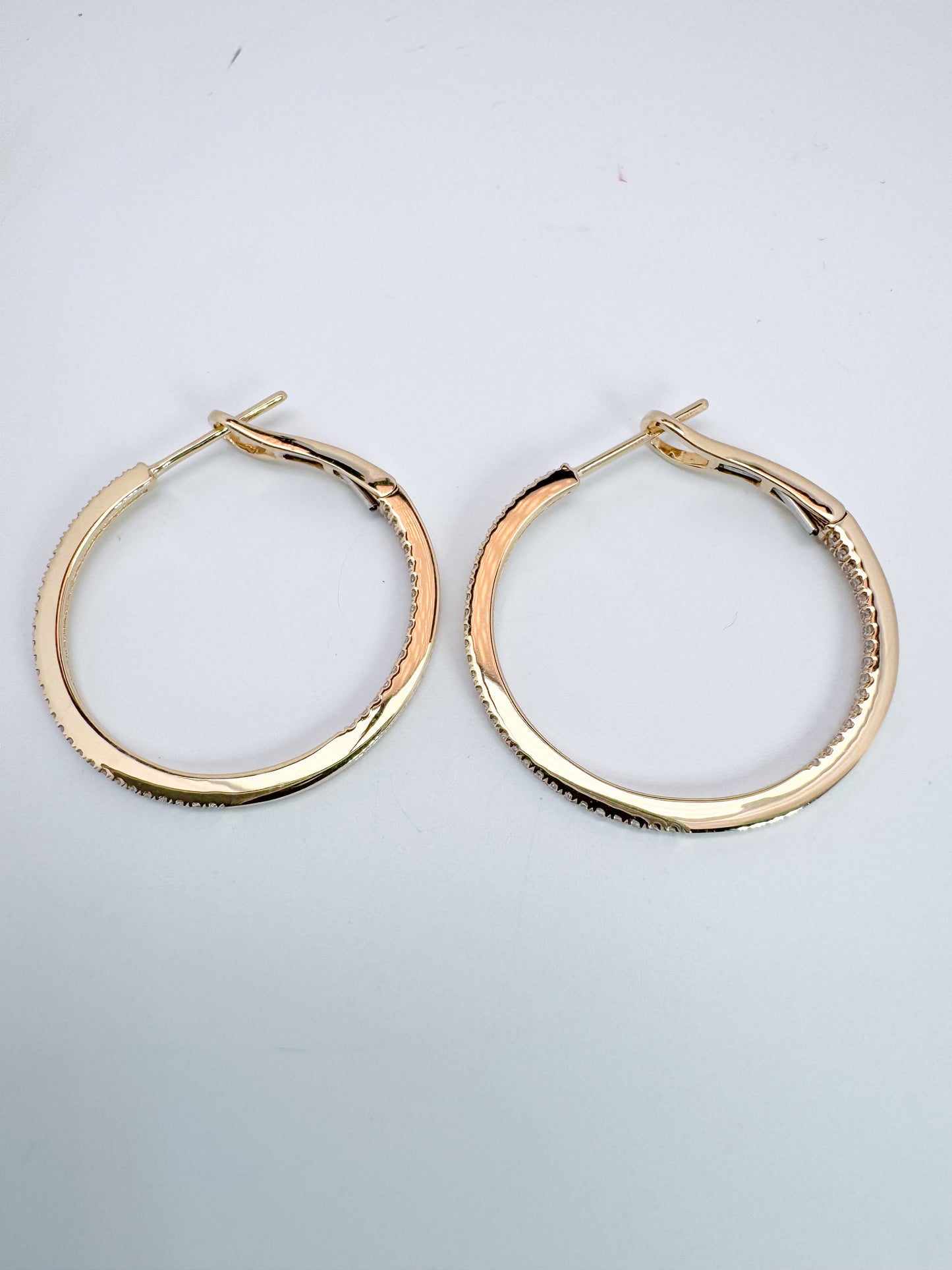 14K, yellow gold, inside out diamond hoop earrings. .28 carat total weight