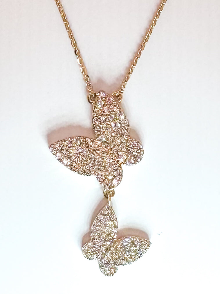 14K, Yellow gold, .78 diamond total weight, double butterfly necklace.