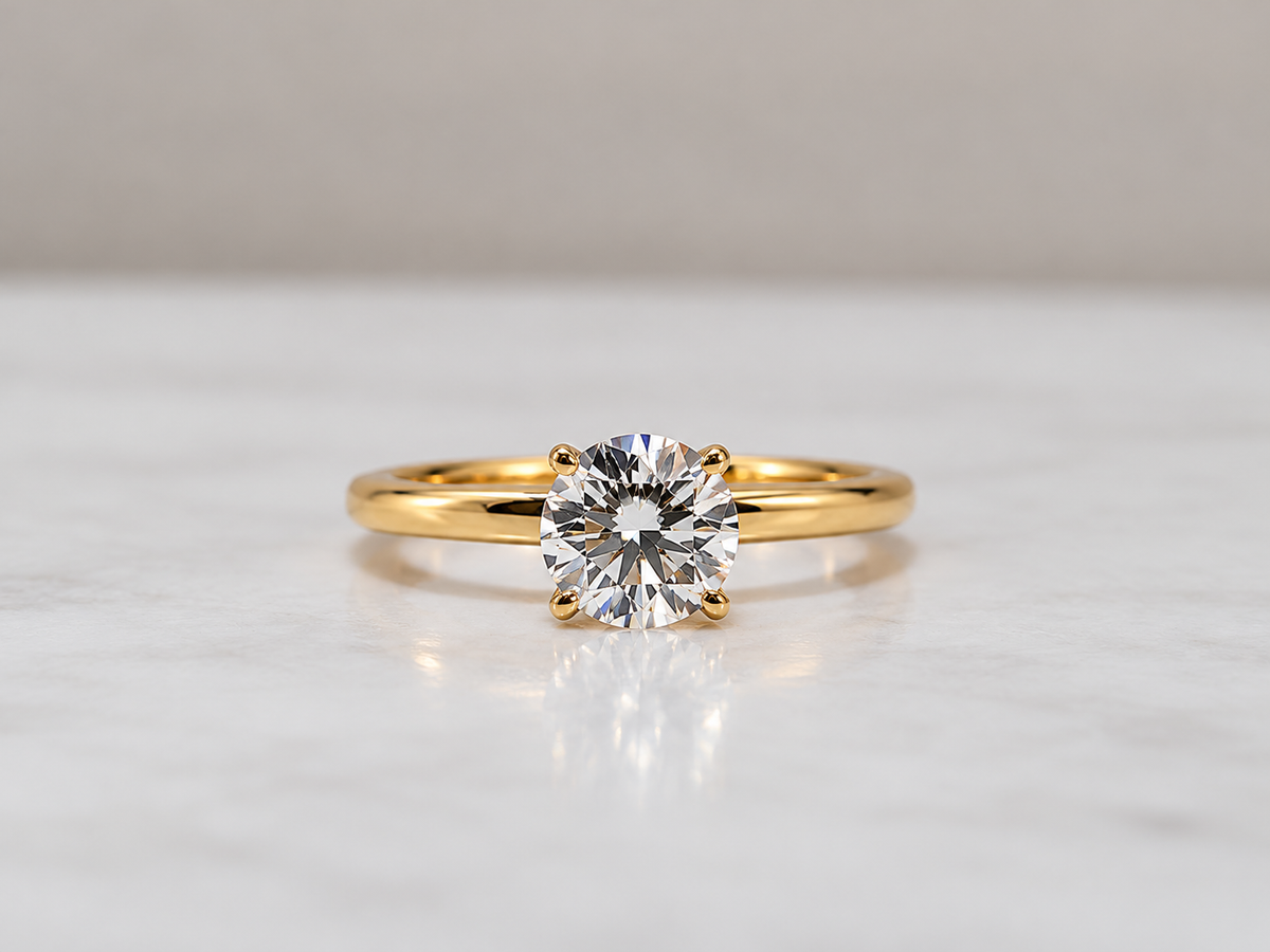14K, Yellow gold, round brilliant 1.00 carat lab grown solitaire. VS2 G