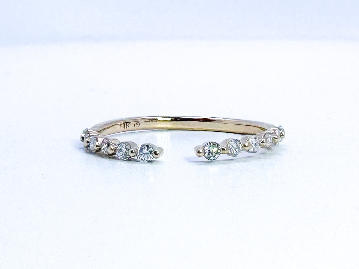 14K, yellow gold open concept, natural diamond band. .24 carat total weight