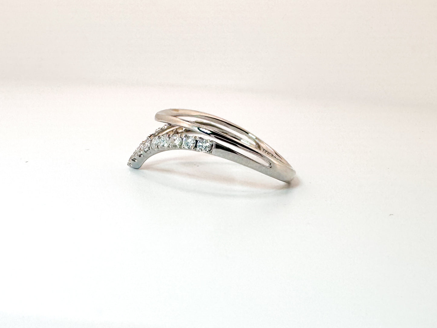 14k, white gold .30 diamond total weight wedding band.