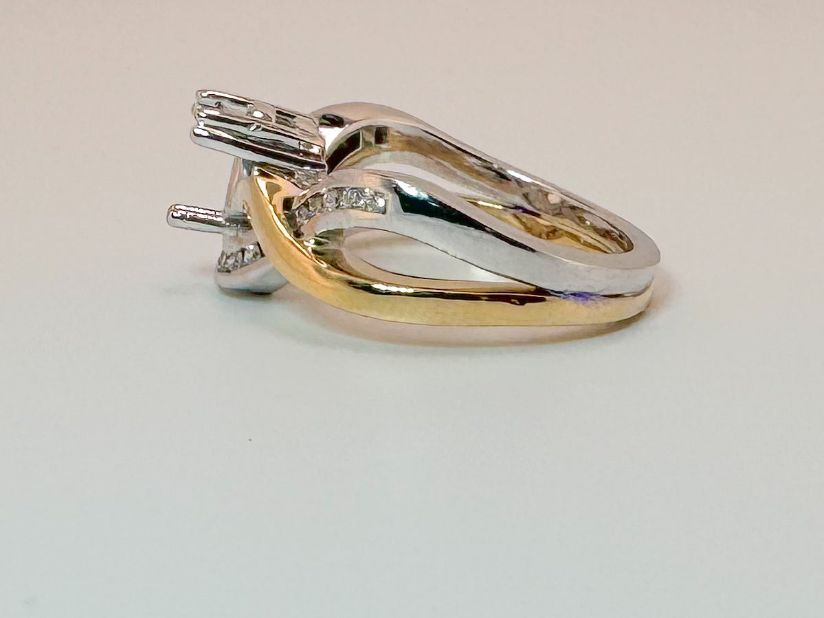 14K,two tone, .25 natural side diamond engagement mounting. Holds 1.00 carat round center stone