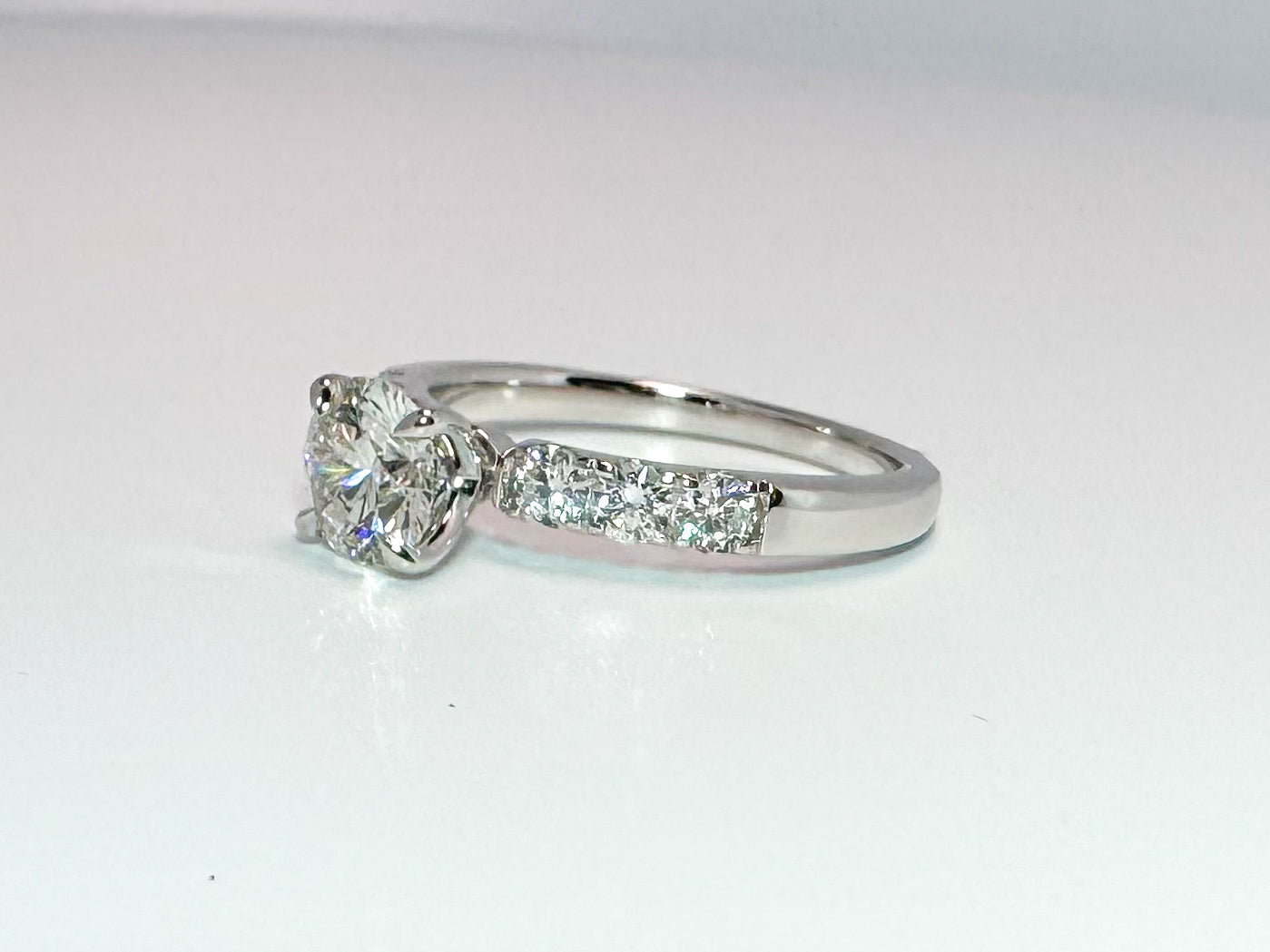 14K white gold lab grown diamond engagement ring. 1.00 center with .49 side diamonds. VS2 F