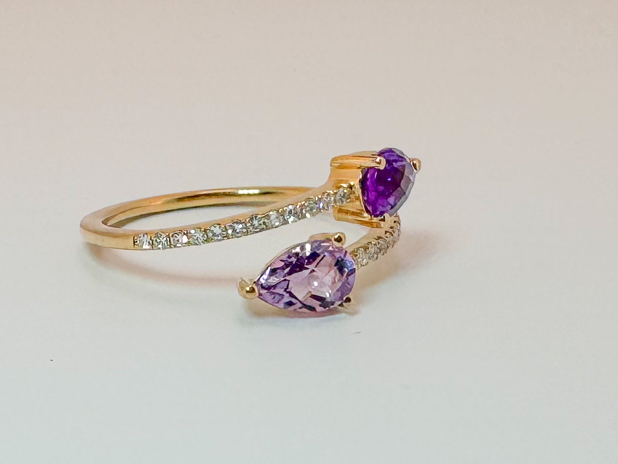 14k, yellow gold, .60 carat total weight Amethyst with .15 diamond total weight side diamond, open concept fashion ring.