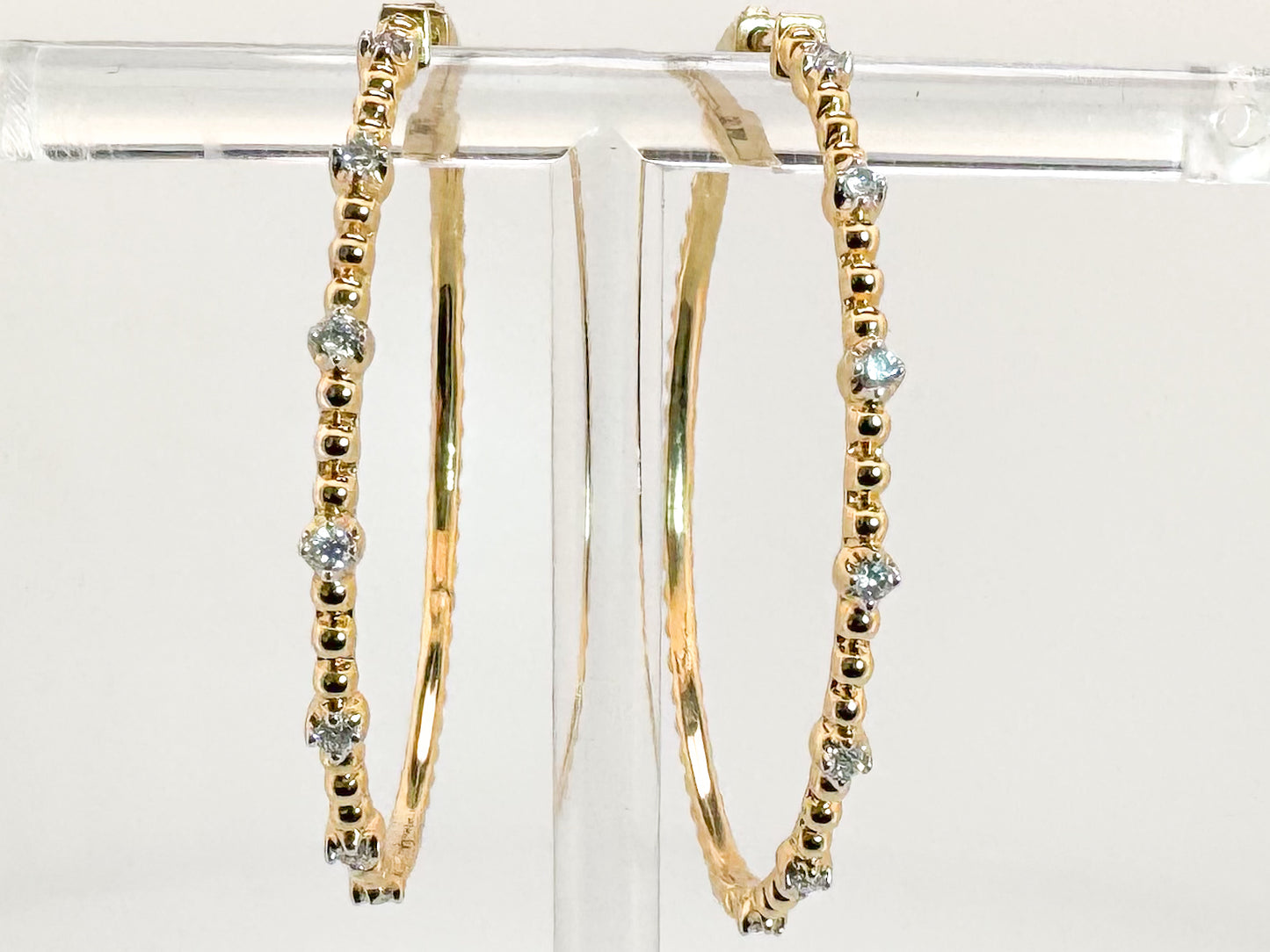 14K, yellow gold, beaded, diamond hoop earrings. .25 carat total weight