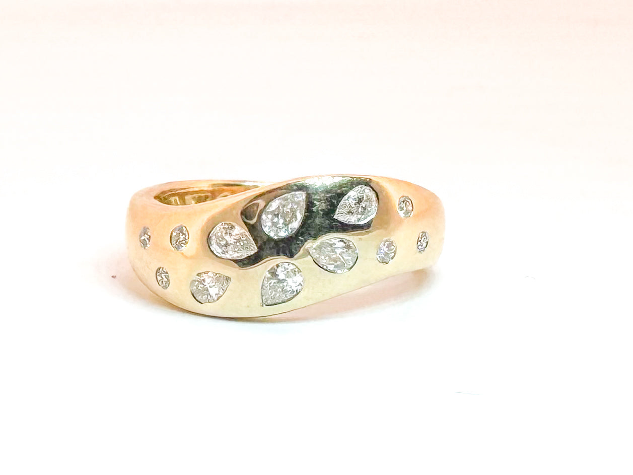 14K, yellow gold flush set .45 carat total weight diamond fashion ring.