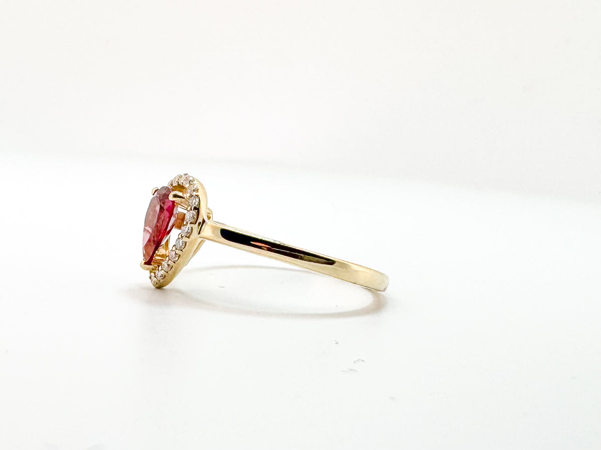 14K, Yellow gold, .75 carat, Rhodolite garnet ring with .12 carats of side diamonds.