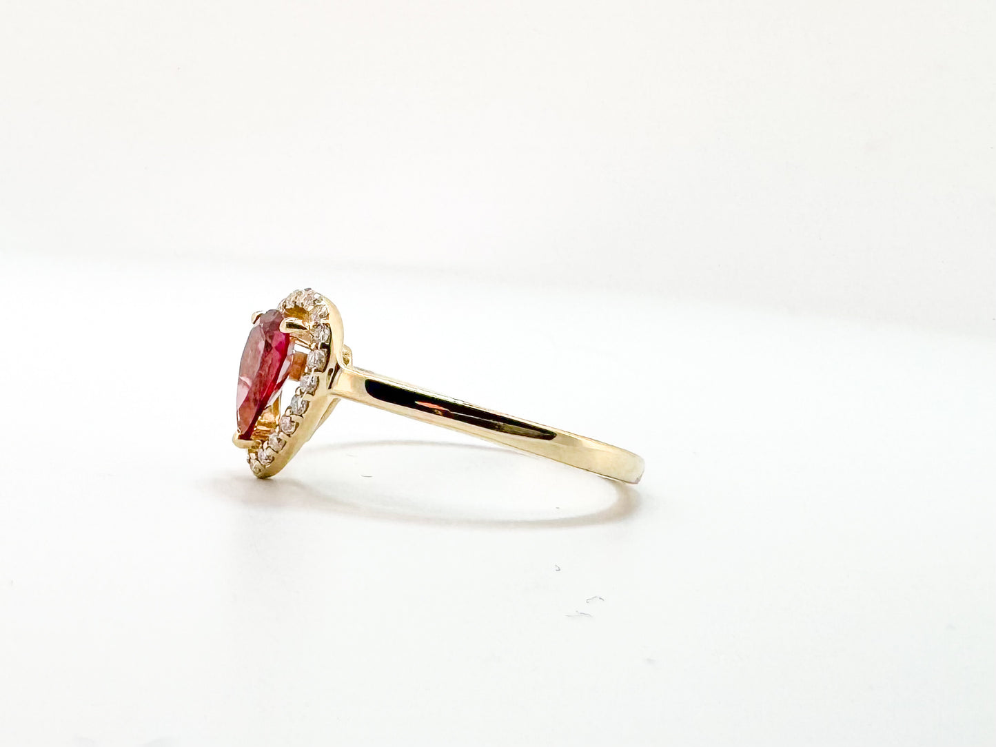 14K, Yellow gold, .75 carat, Rhodolite garnet ring with .12 carats of side diamonds.