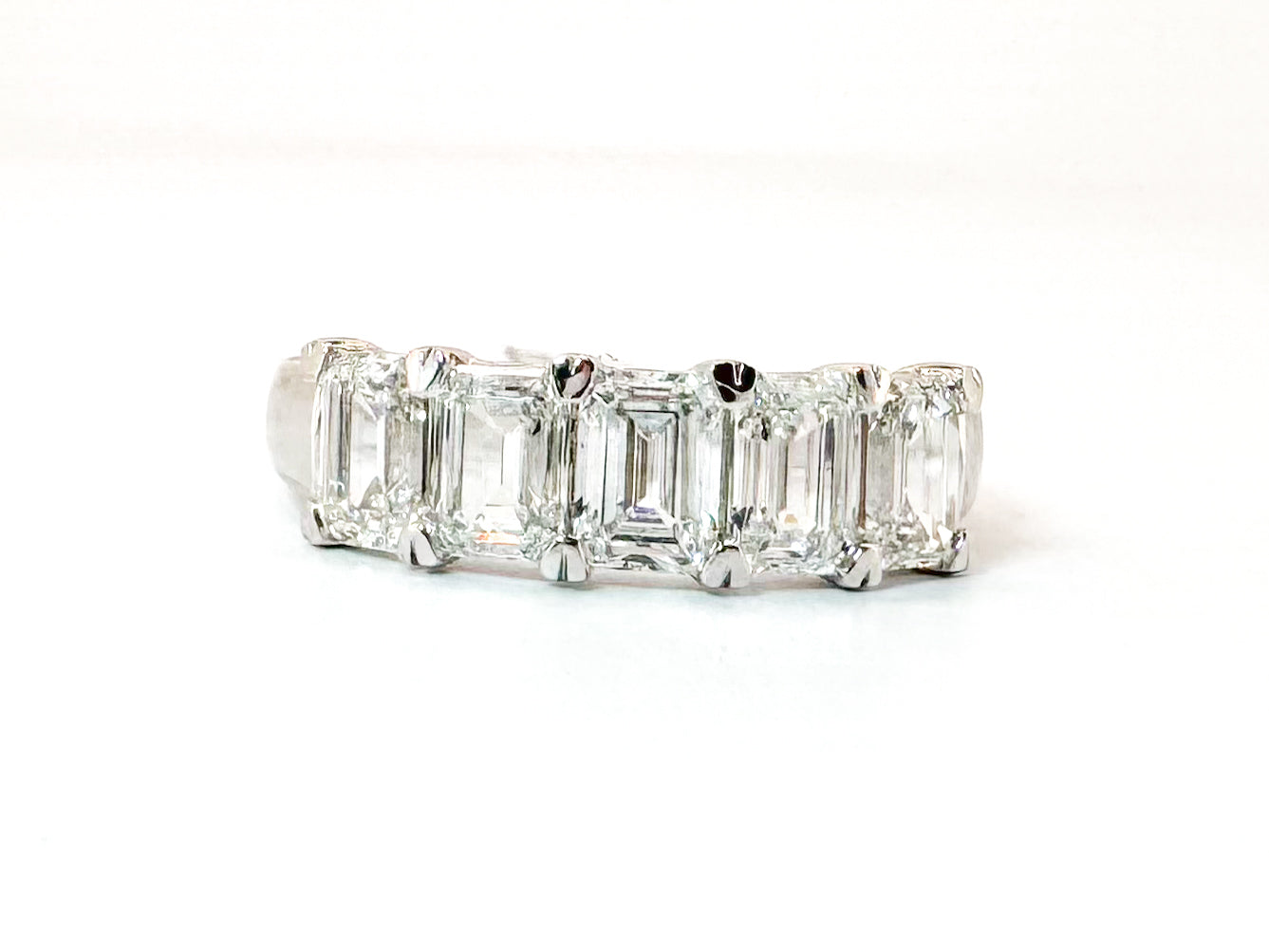 14k, White gold, five lab diamond, emerald cut band. 2.00 carat total weight.