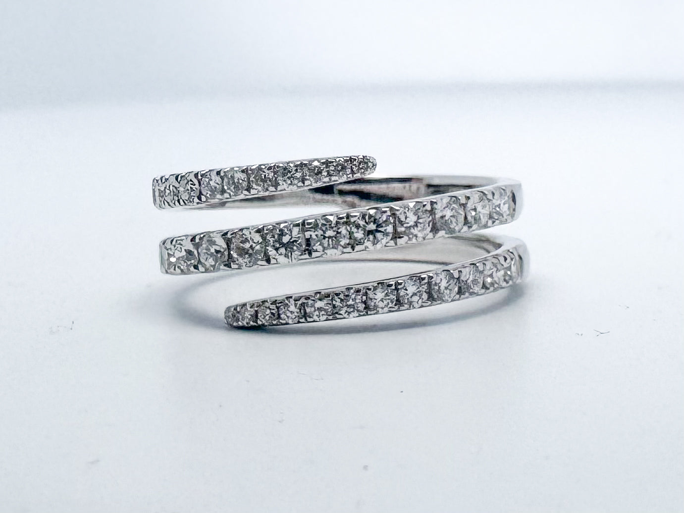 14k, white gold .73 carat total weight bypass diamond ring.