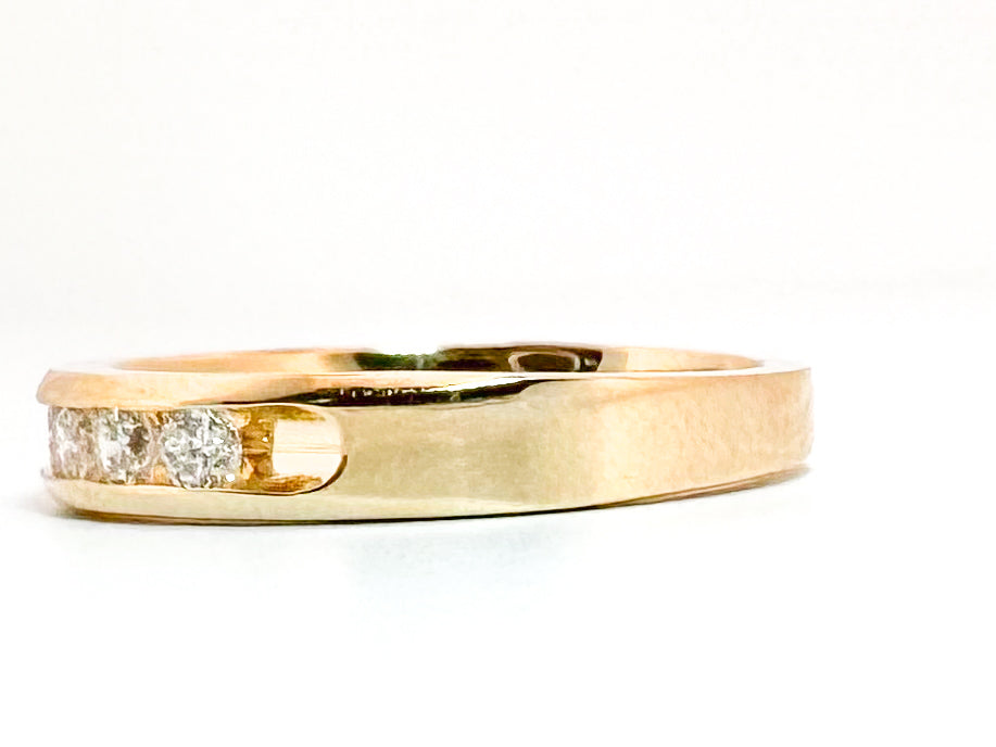 14K, yellow gold, .50 carat total weight, channel set band.