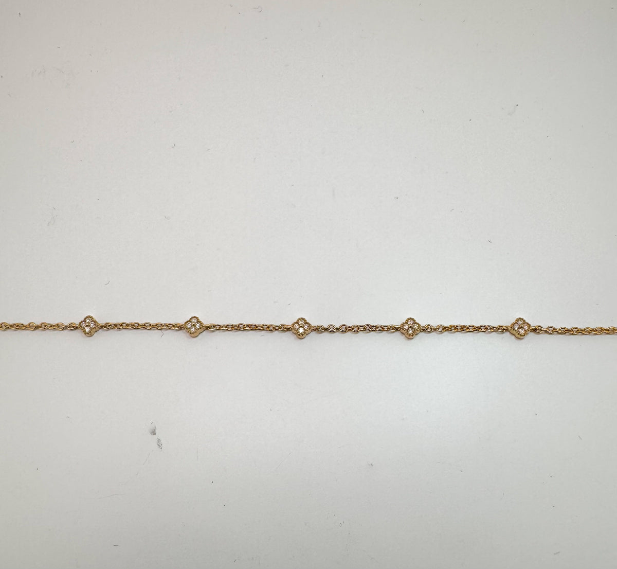 14K, yellow gold petite diamond, alahambra tennis bracelet. 7.5"