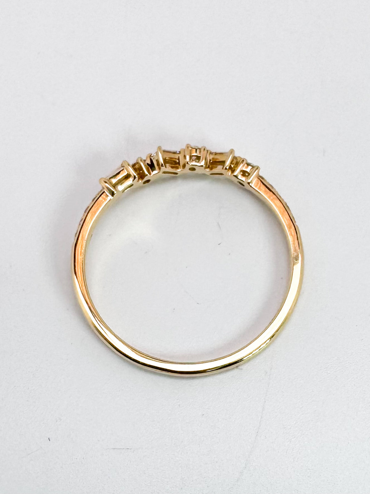 14K, Yellow gold .23 diamond total weight, baguette and round brilliant diamond band