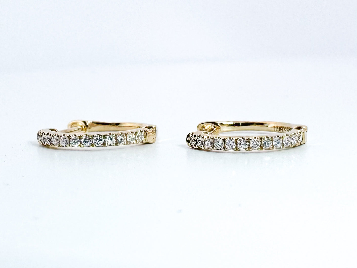 14k, Yellow gold, .15 diamond total weight, huggie diamond earrings.