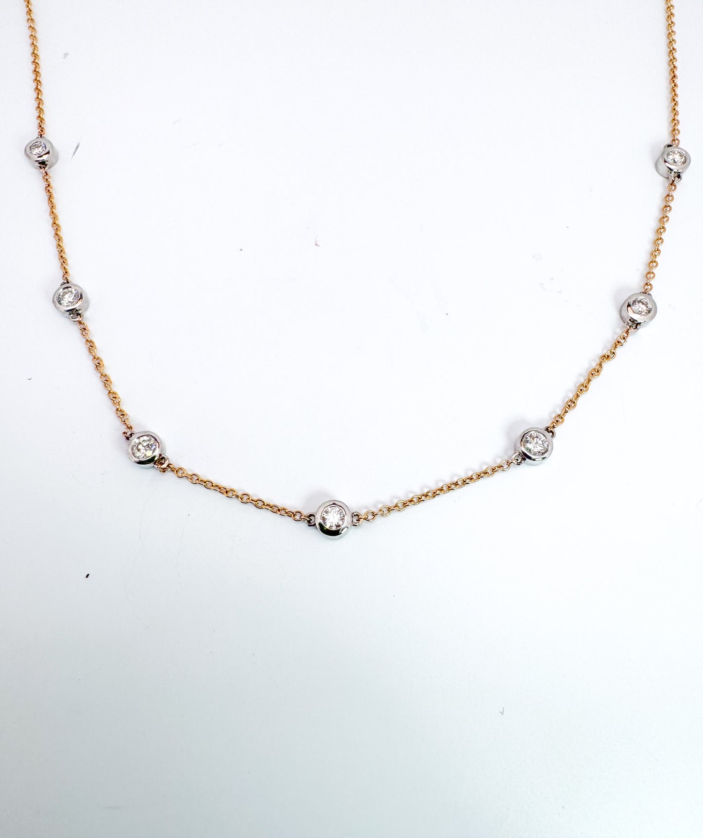 14k, two tone, natural diamonds by the yard necklace. .47 diamond total weight