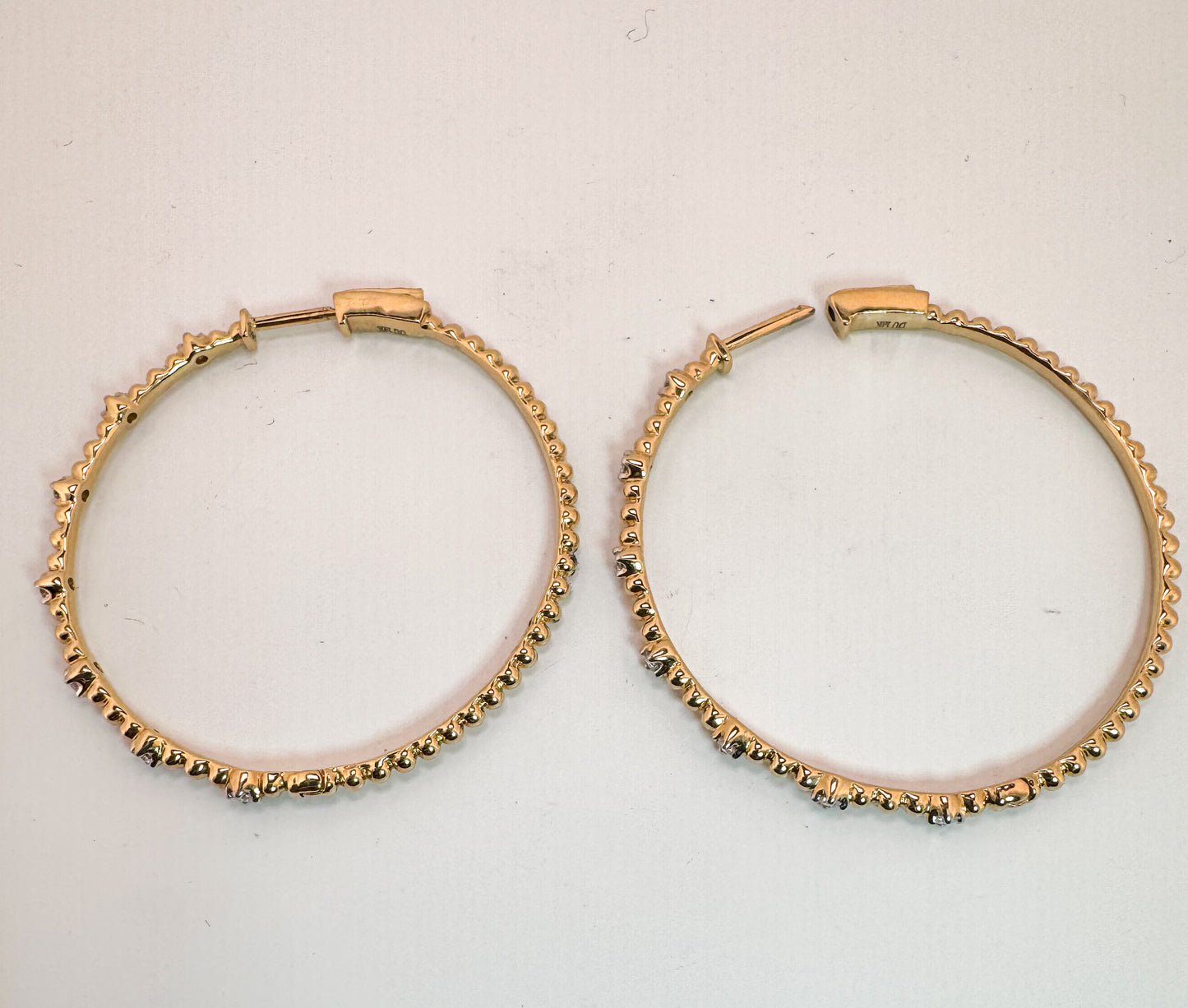 14K, yellow gold, beaded, diamond hoop earrings. .25 carat total weight