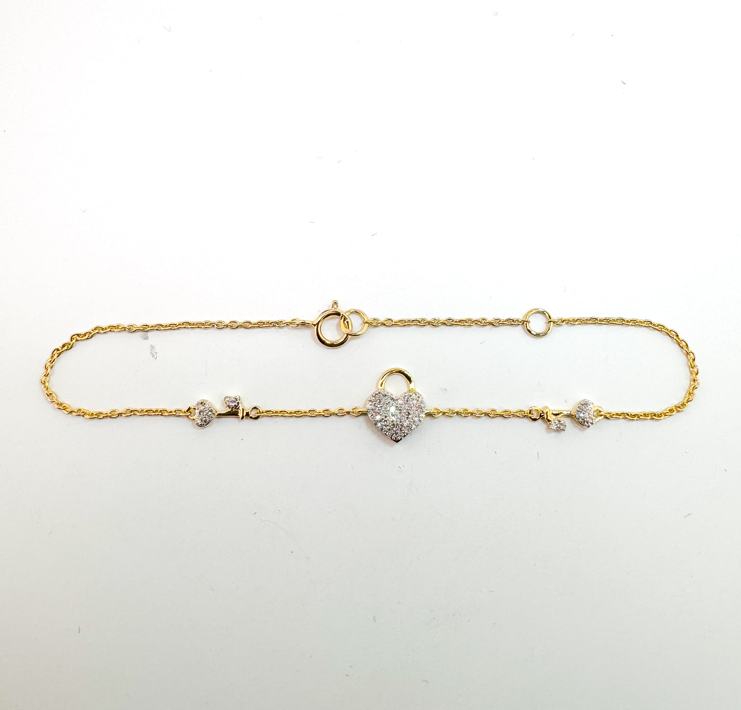 14K, yellow gold, pave diamond heart locket and key tennis bracelet.