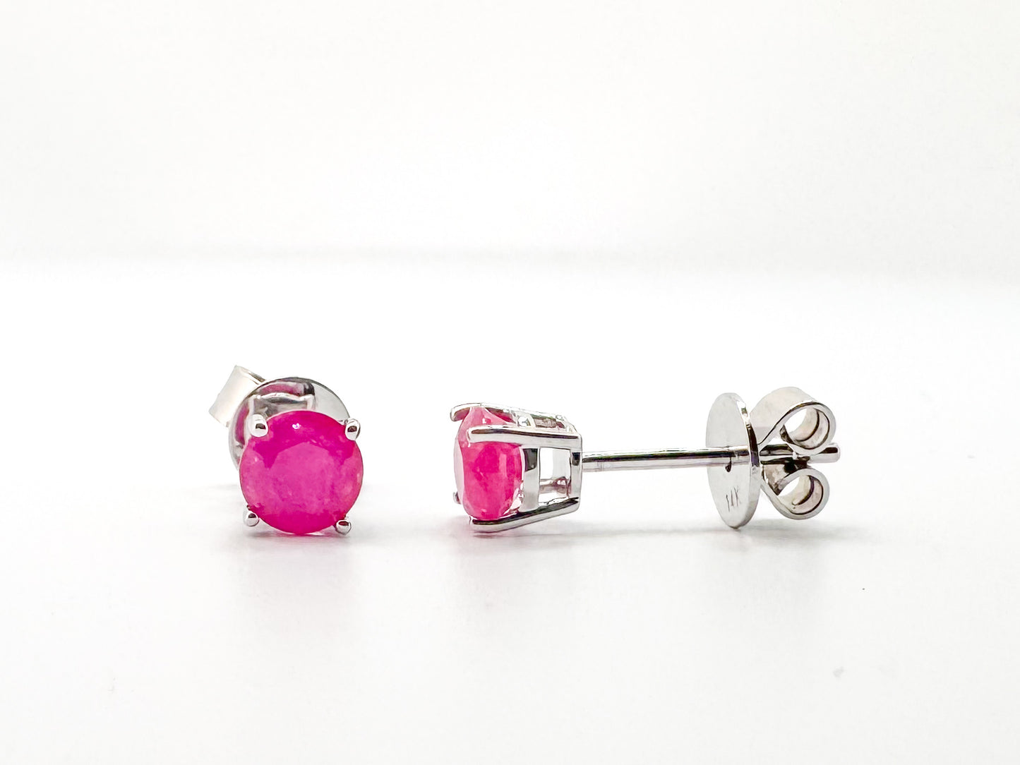 14K white gold, natural ruby stud earrings.