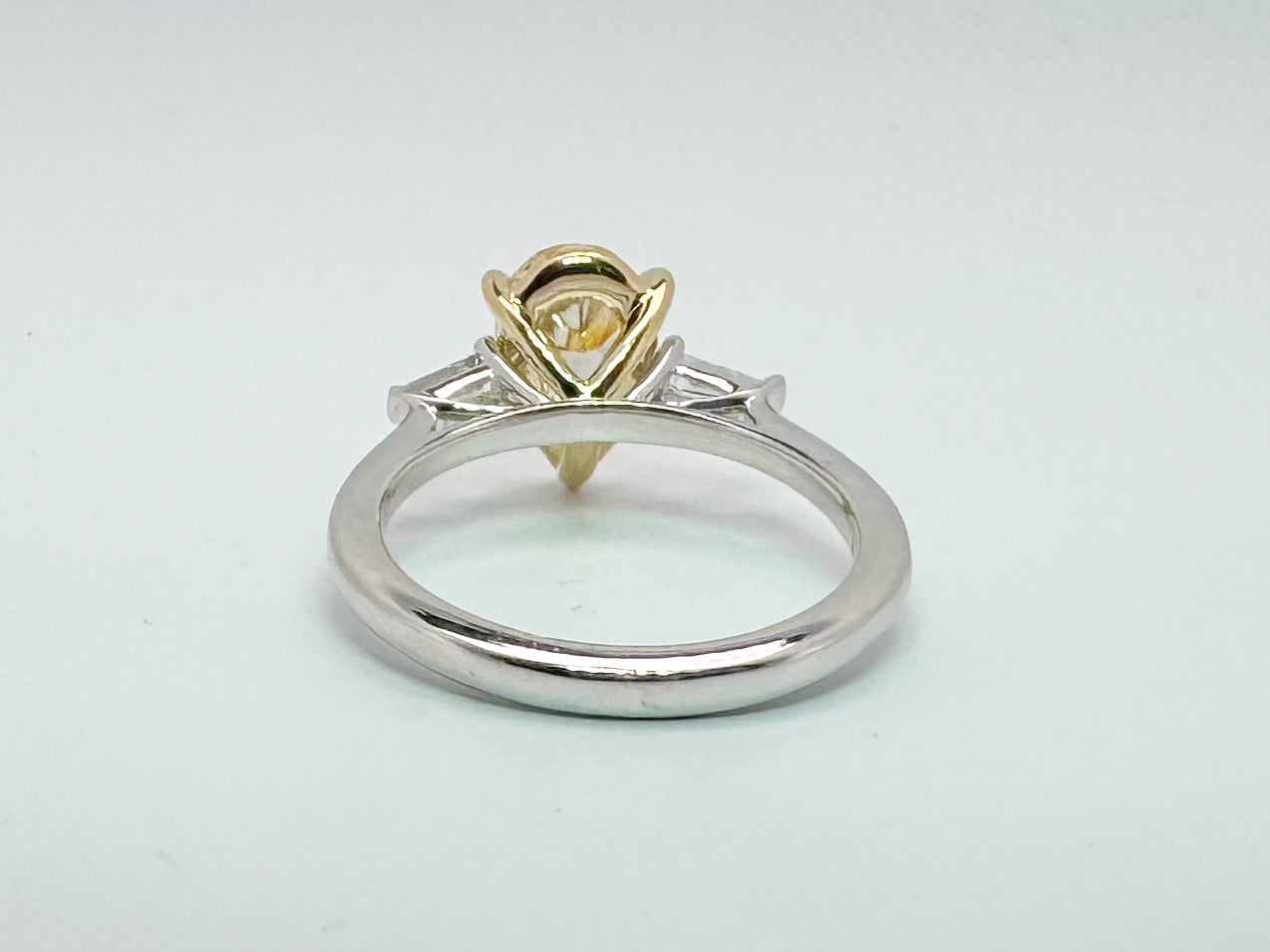 14K two tone, 1.54 pear shaped VS2 Fancy yellow lab grown diamond engagement ring.