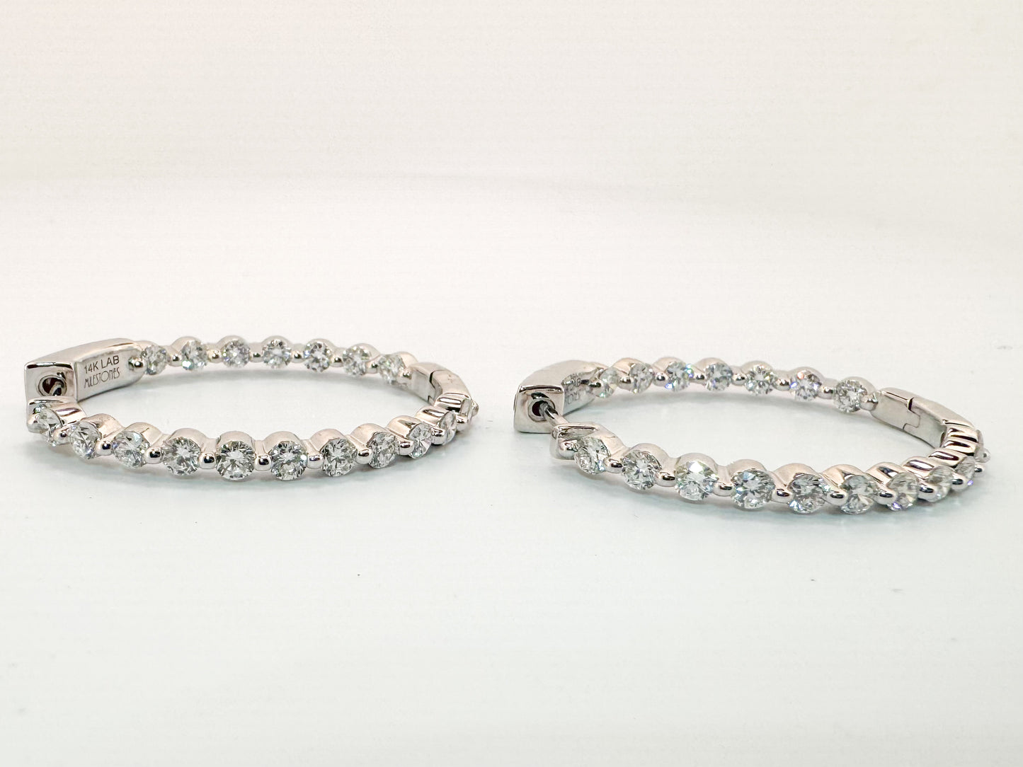 14K, white gold 2.50 carat total weight, inside out lab diamond hoop earrings.