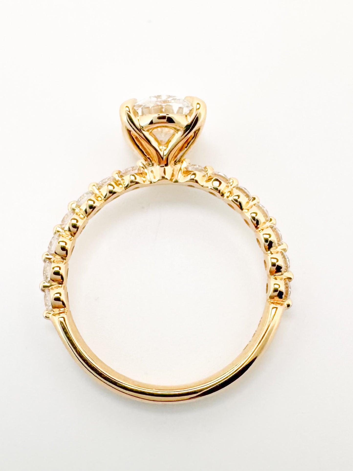 14K, Yellow gold, 2.04 carat, Lab grown oval diamond, set with .35 carats of side diamonds. IGI Certified