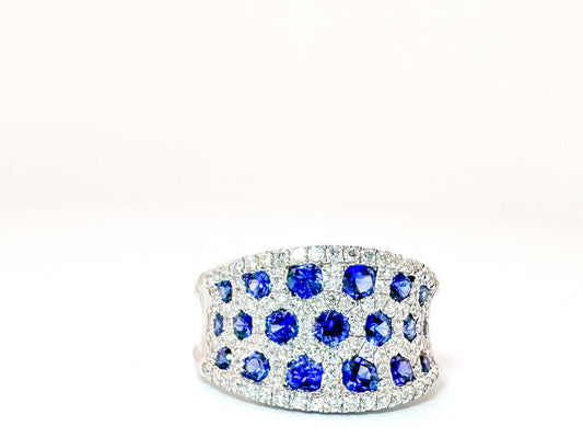 18k, white gold, 1.18 natural sapphire set with .62 carats of natural side diamonds.