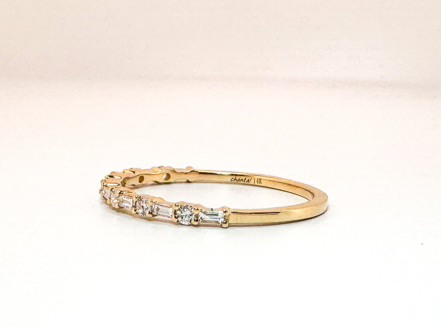 14K, yellow gold, .26 diamond total weight, baguette and round brillioant wedding band.