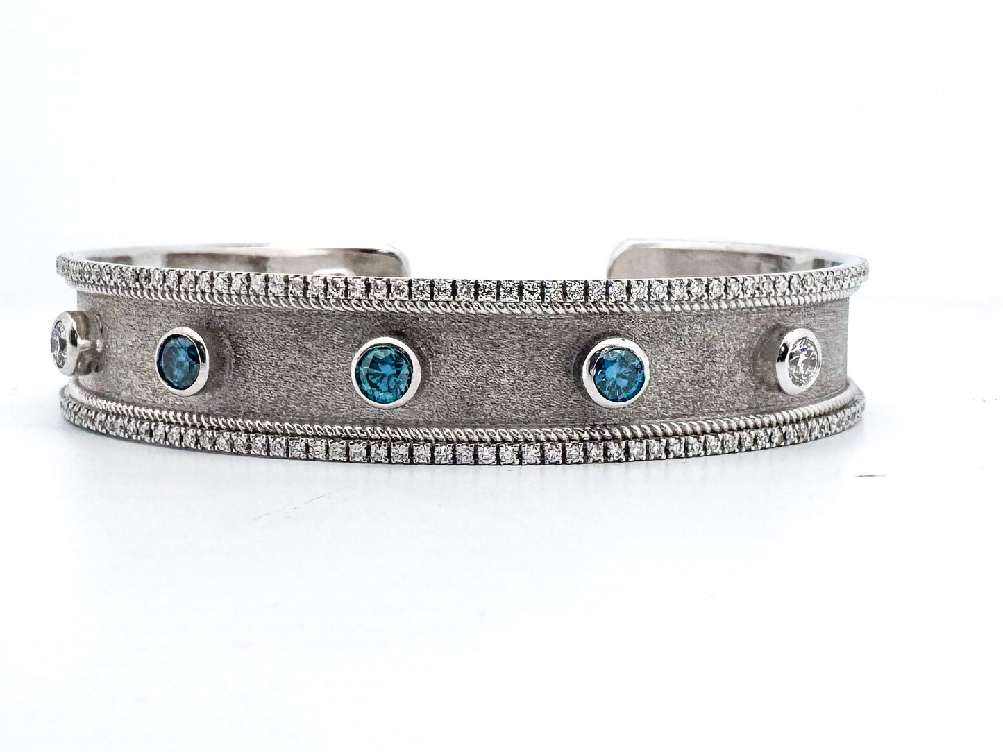 18k, White gold S.Georgios desighner diamond bangle bracelet. 2.45 carats.